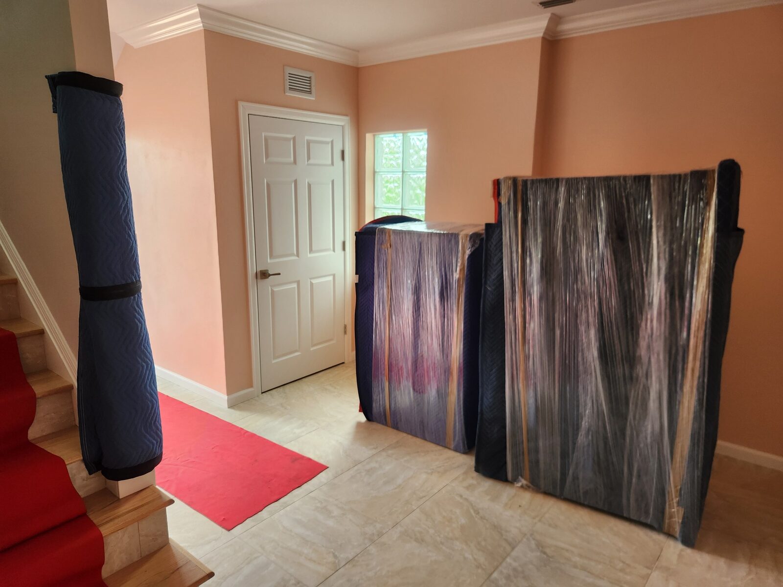 Furniture carefully padded and shrink wrapped for moving