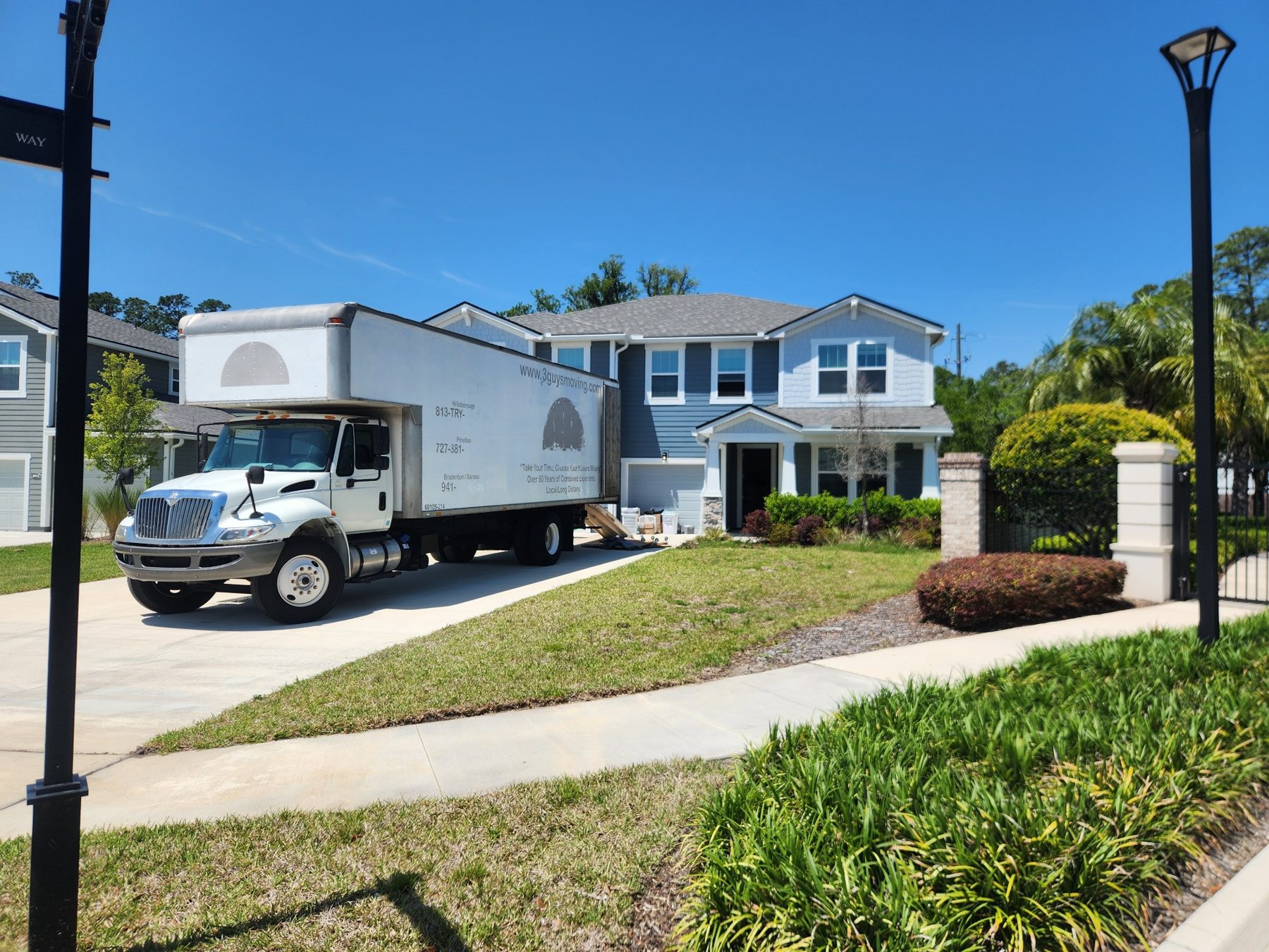 Moving truck staged at a Southwest Florida home